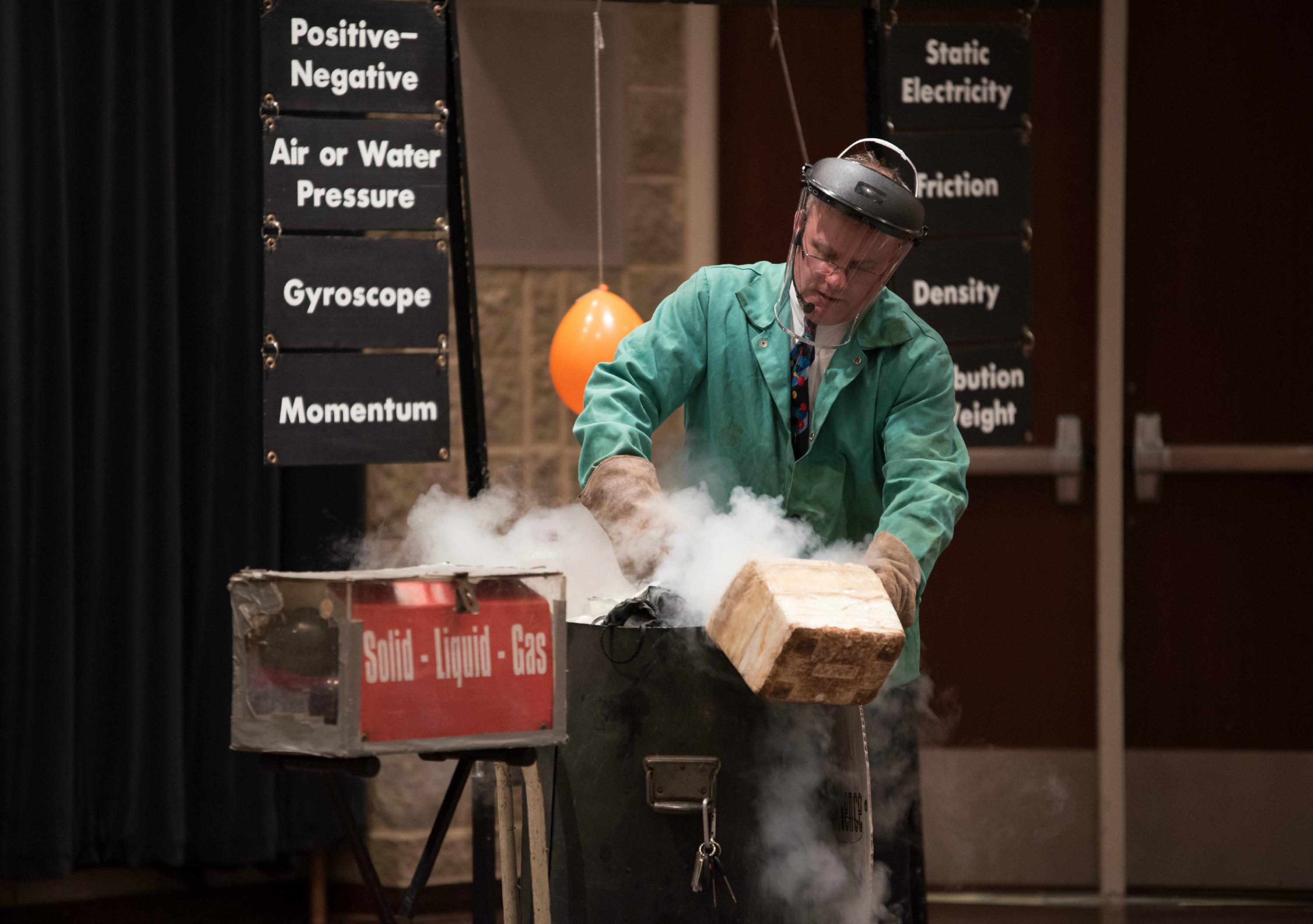 Scientist and magician Steve Belliveau makes a presentation to the audience at Prairie State College (PSC) iDiscover STEM Fun Day event. Belliveau’s presentation included experiments with electro magnets, friction and liquid nitrogen.