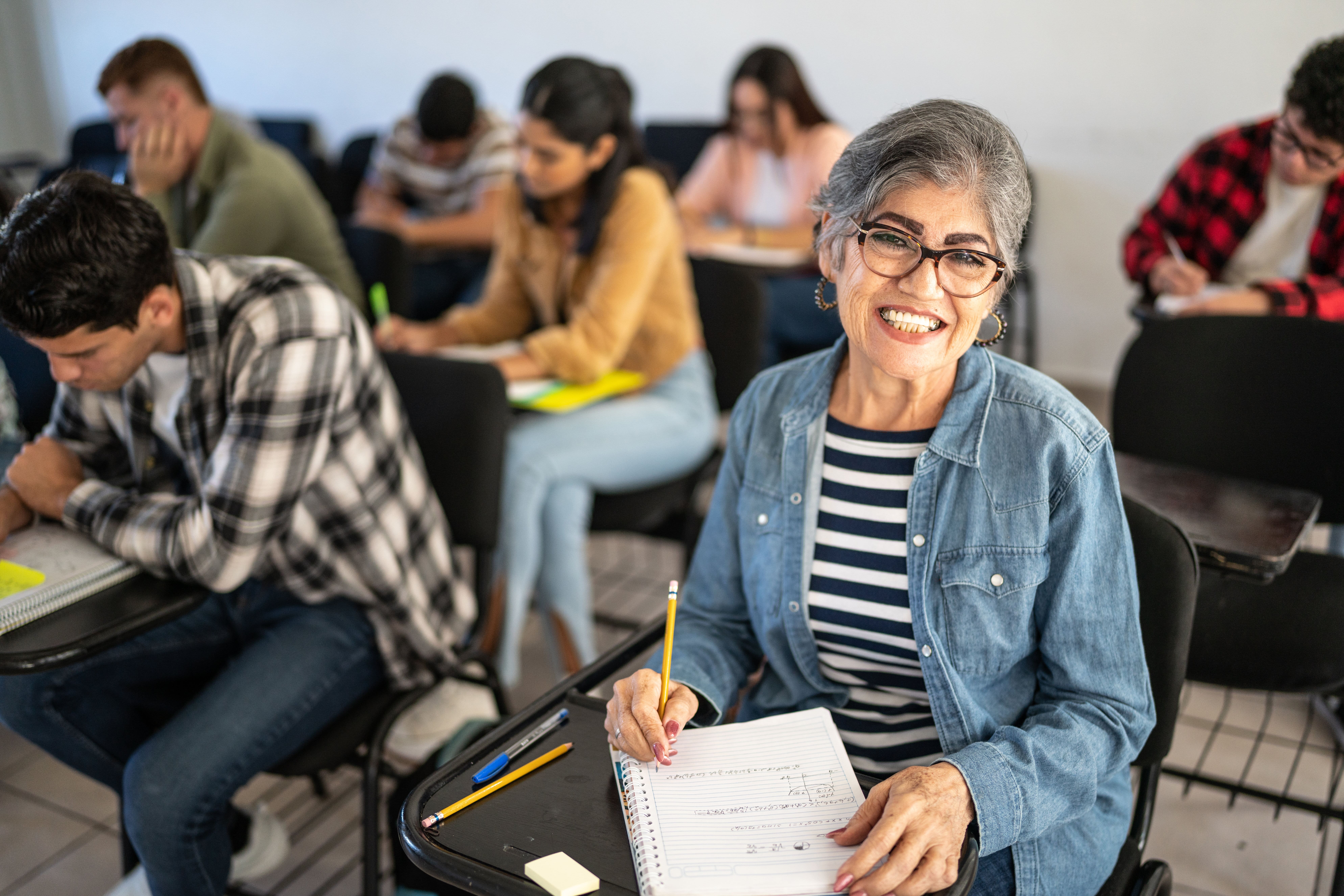 Students in classroom writing